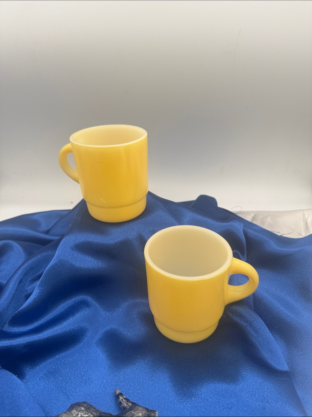 Vintage Fire-King "Golden Yellow" milk glass mugs by Anchor Hocking in the 1960s